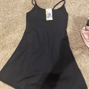 Brand new black Hallar address with shorts underneath